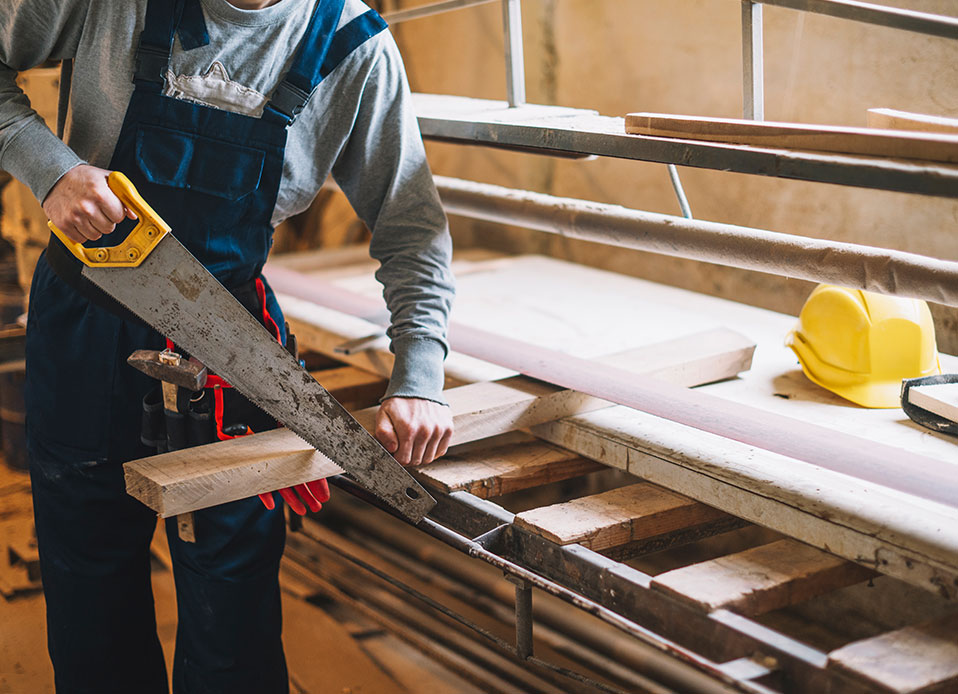 Worker cutting plywood for residential project in St. Louis